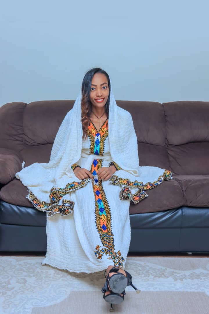 White Traditional Dress with Diamond-Patterned Orange and Blue Embroidery