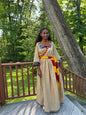 Traditional Dress in Beige with Red, Yellow, and Blue Accents