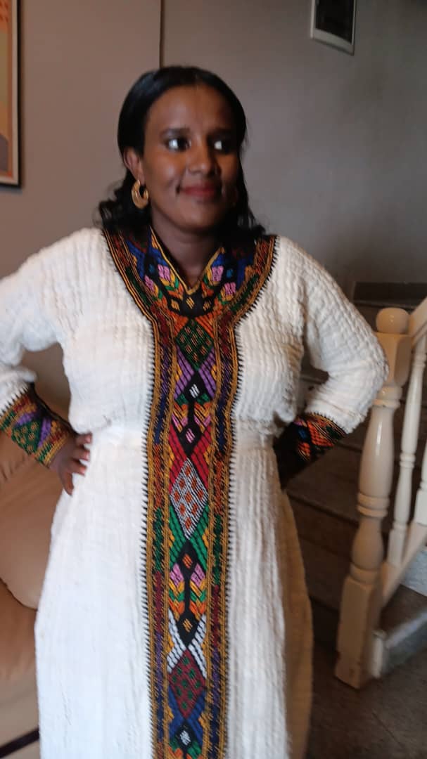 Ethiopian White Traditional Dress with Vibrant Handwoven Patterns