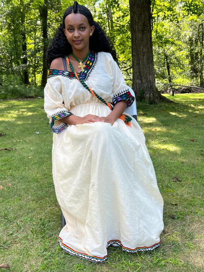 Traditional Cream Ethiopian Dress with Colorful Neckline and Sleeve Embroidery
