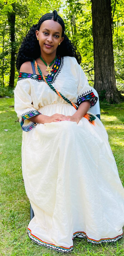 Traditional Cream Ethiopian Dress with Colorful Neckline and Sleeve Embroidery