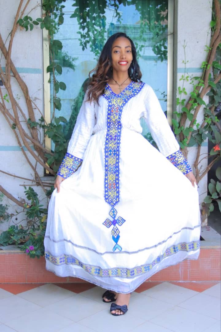 Traditional White Dress with Blue and Yellow Geometric Embroidery